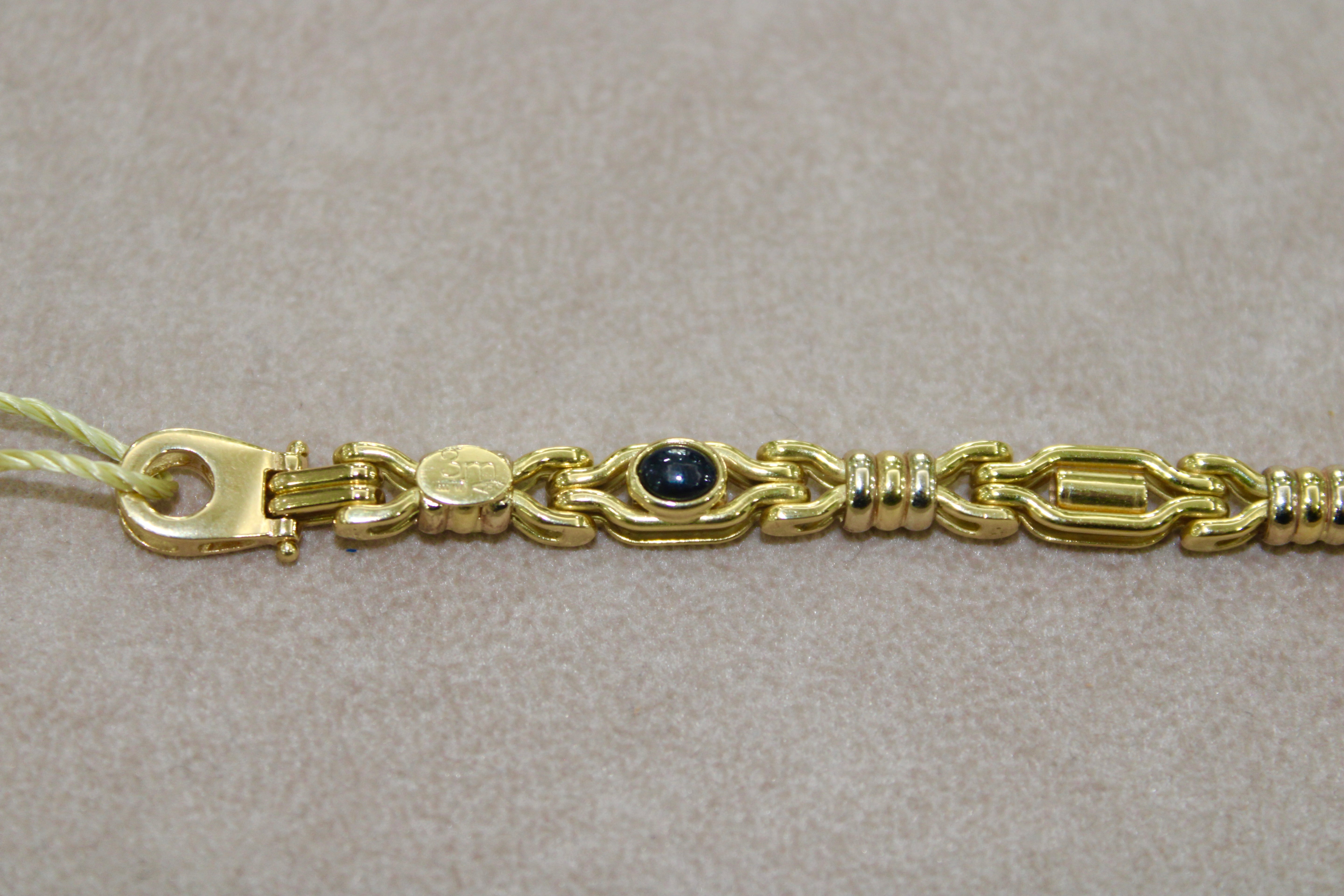 Bracciale in oro giallo 18k con zaffiro cabochon
