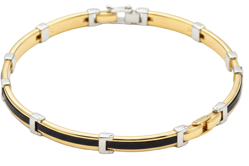 Bracciale rigido in oro giallo 18k