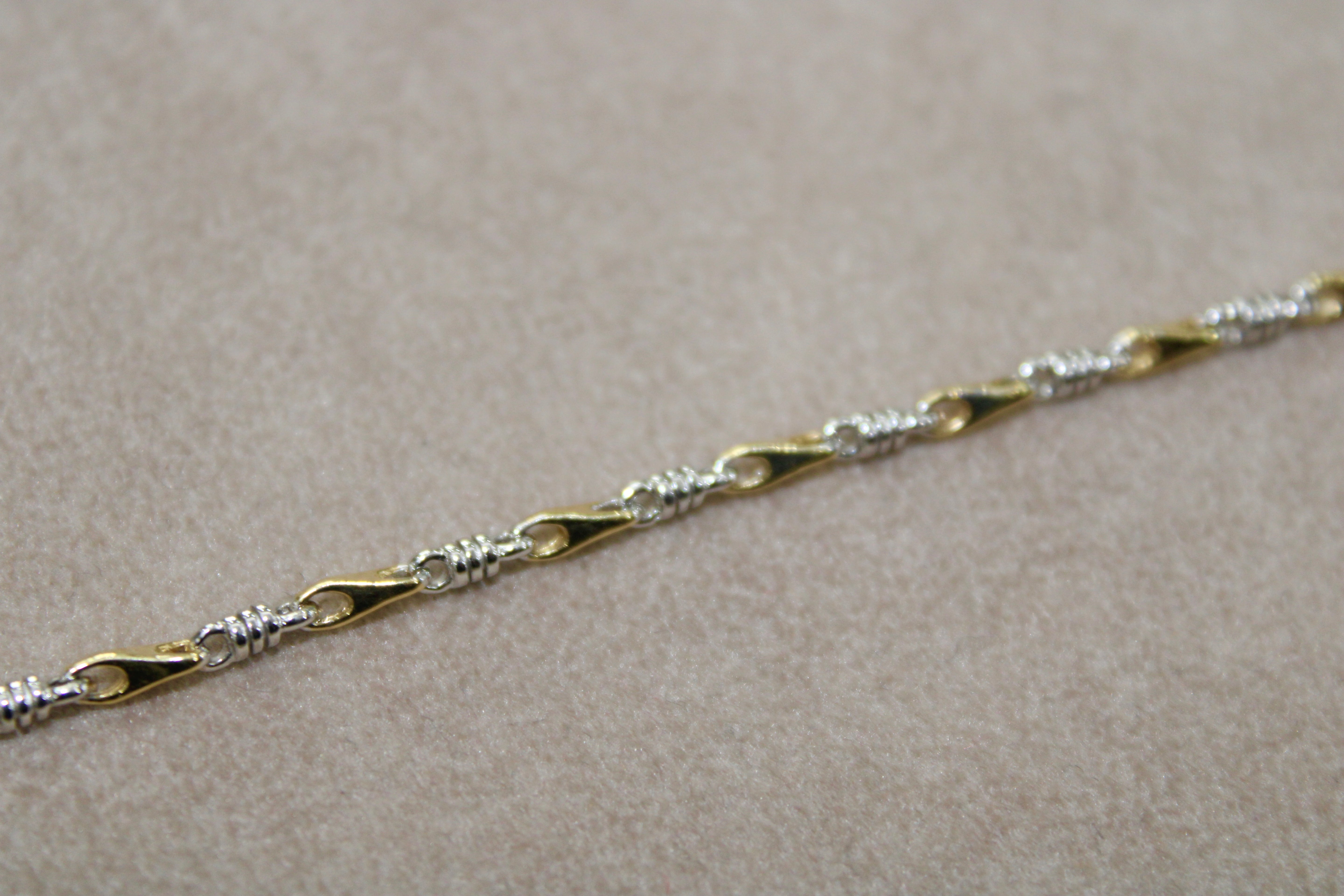 Bracciale bi-colore in oro 18k