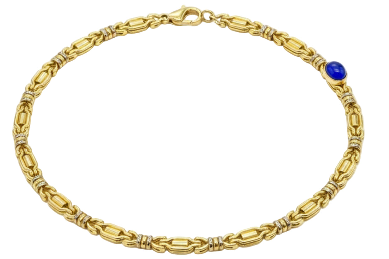 Bracciale in oro giallo 18k con zaffiro cabochon