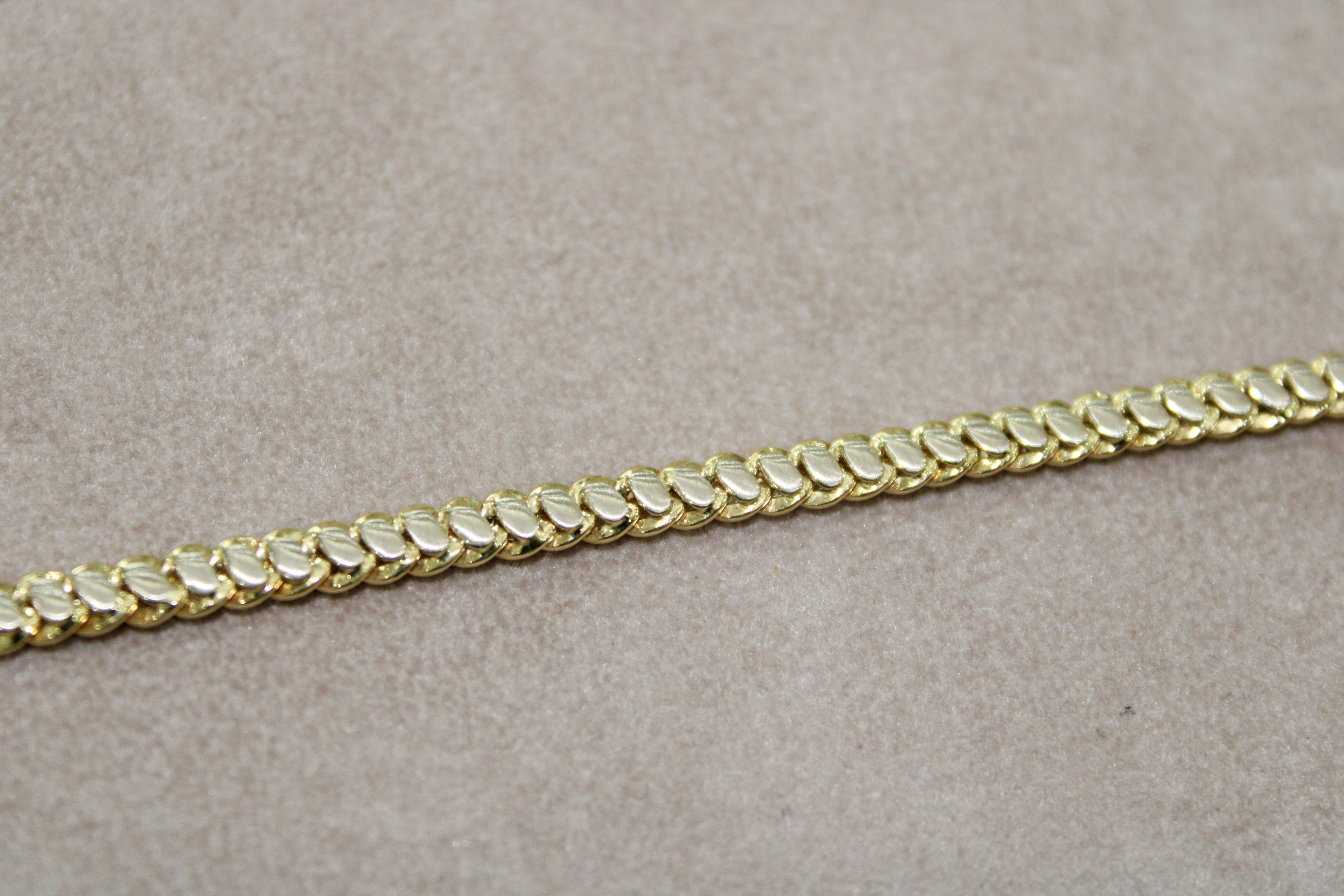Bracciale bi-colore in oro 18k