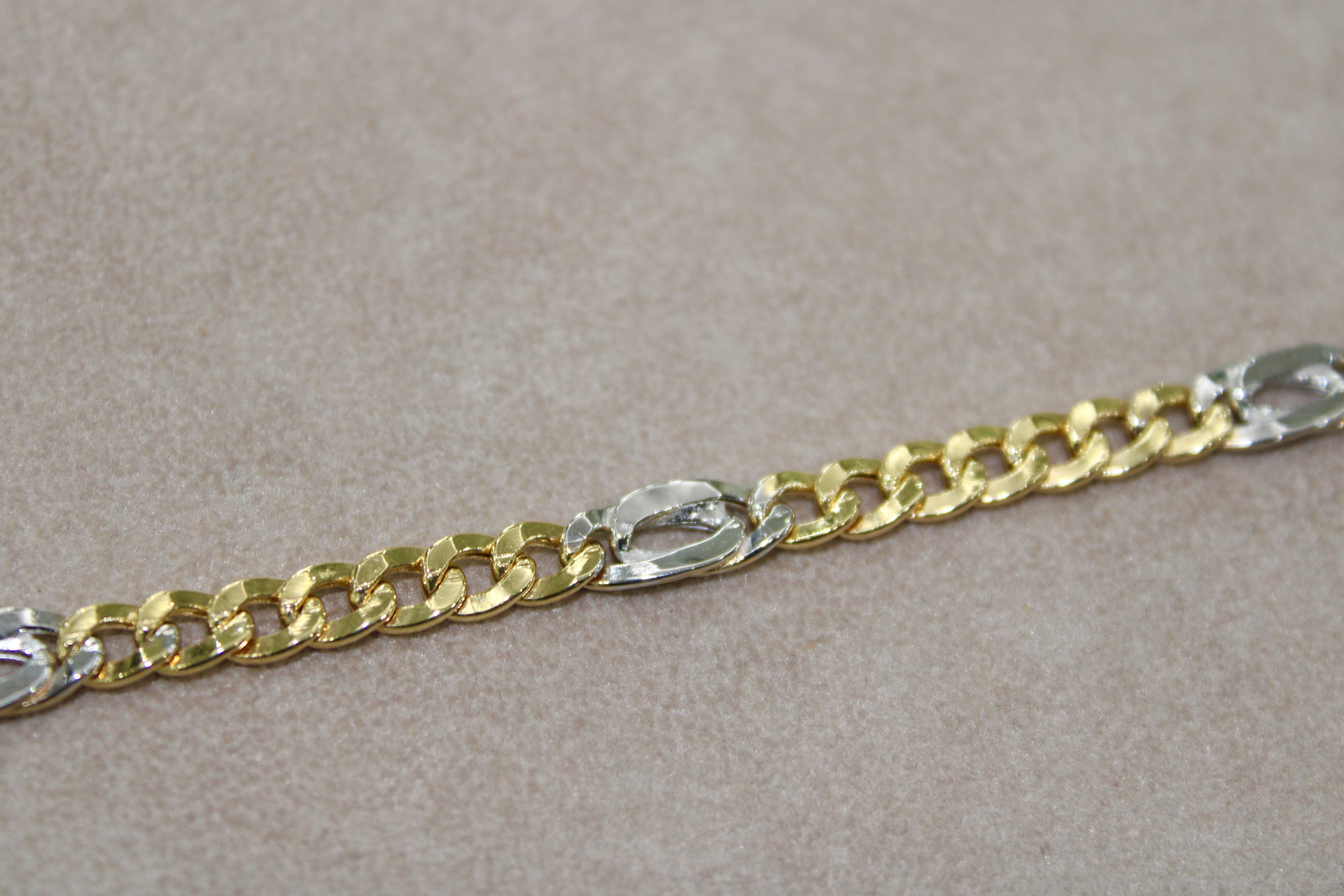 Bracciale bi-colore in oro 18k