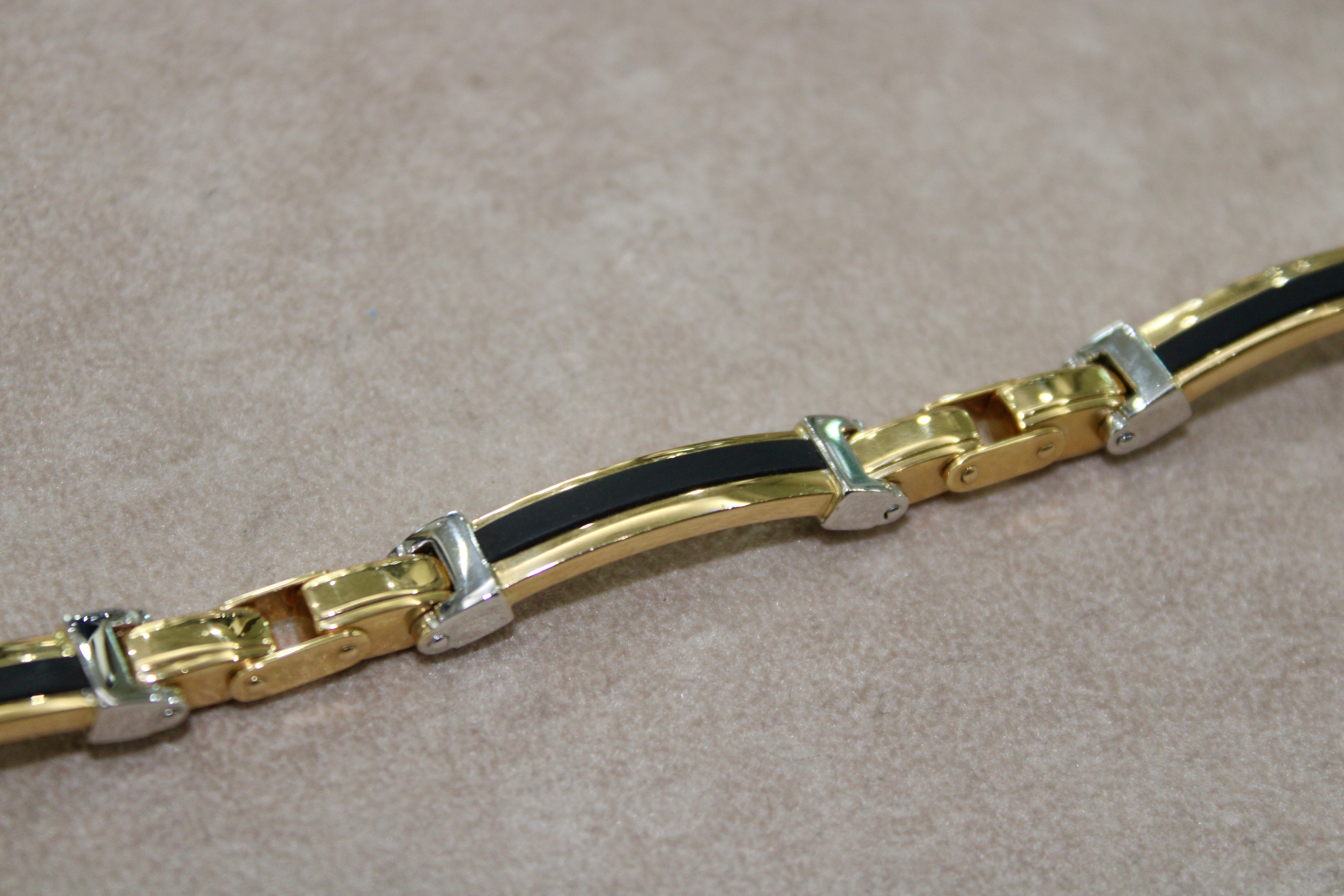 Bracciale rigido in oro giallo 18k
