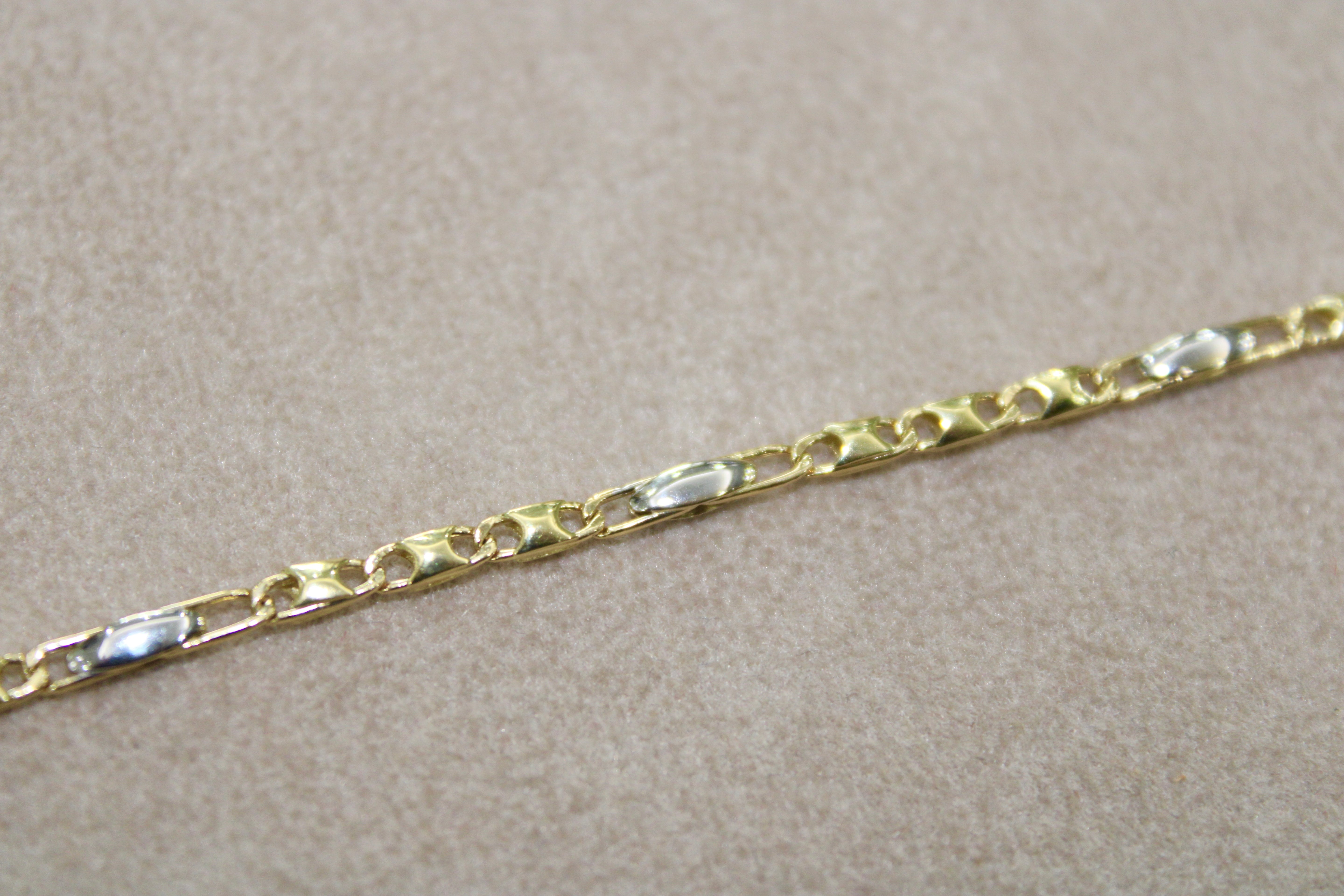 Bracciale bi-colore in oro 18k