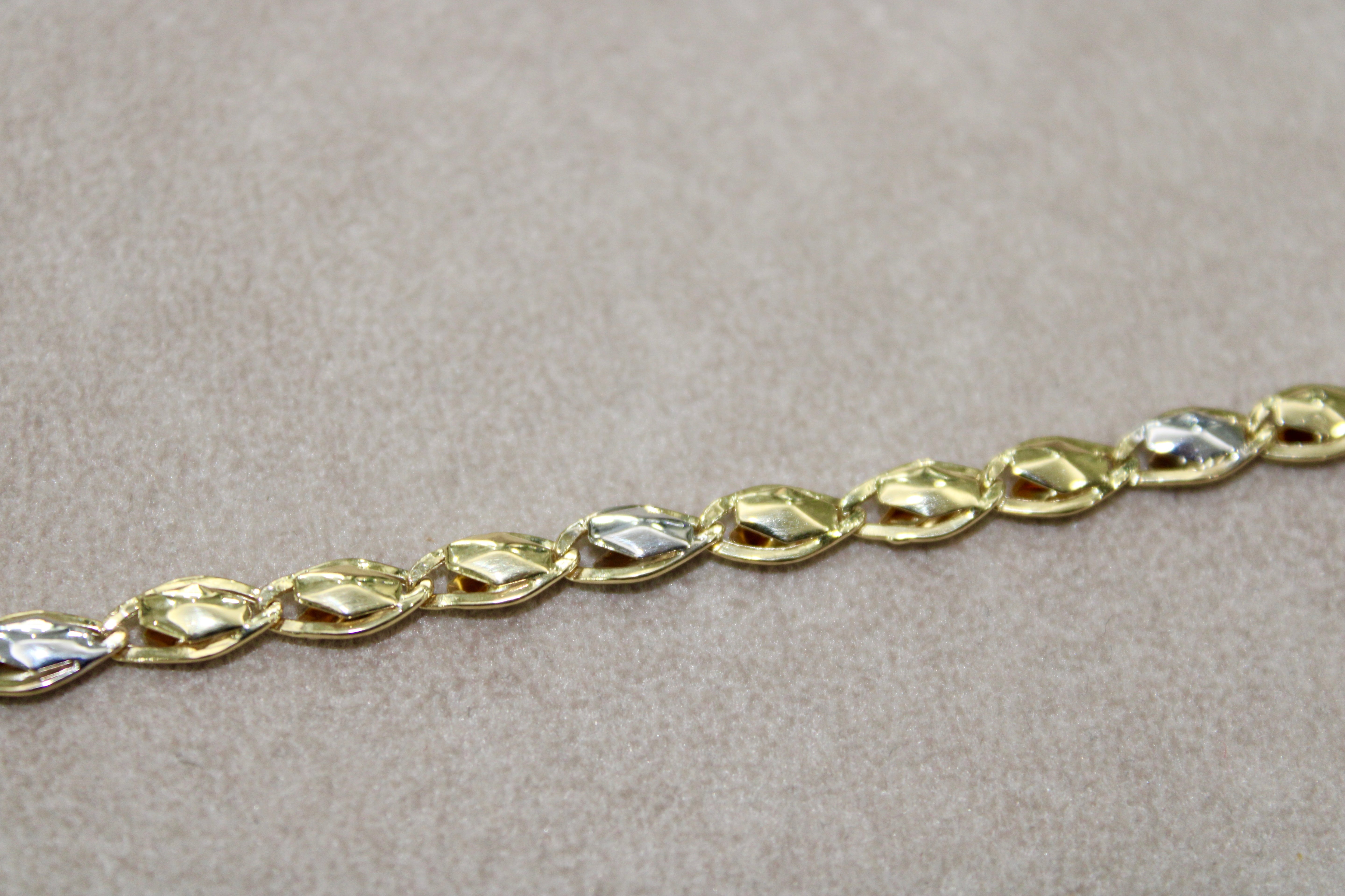 Bracciale bi-colore in oro 18k