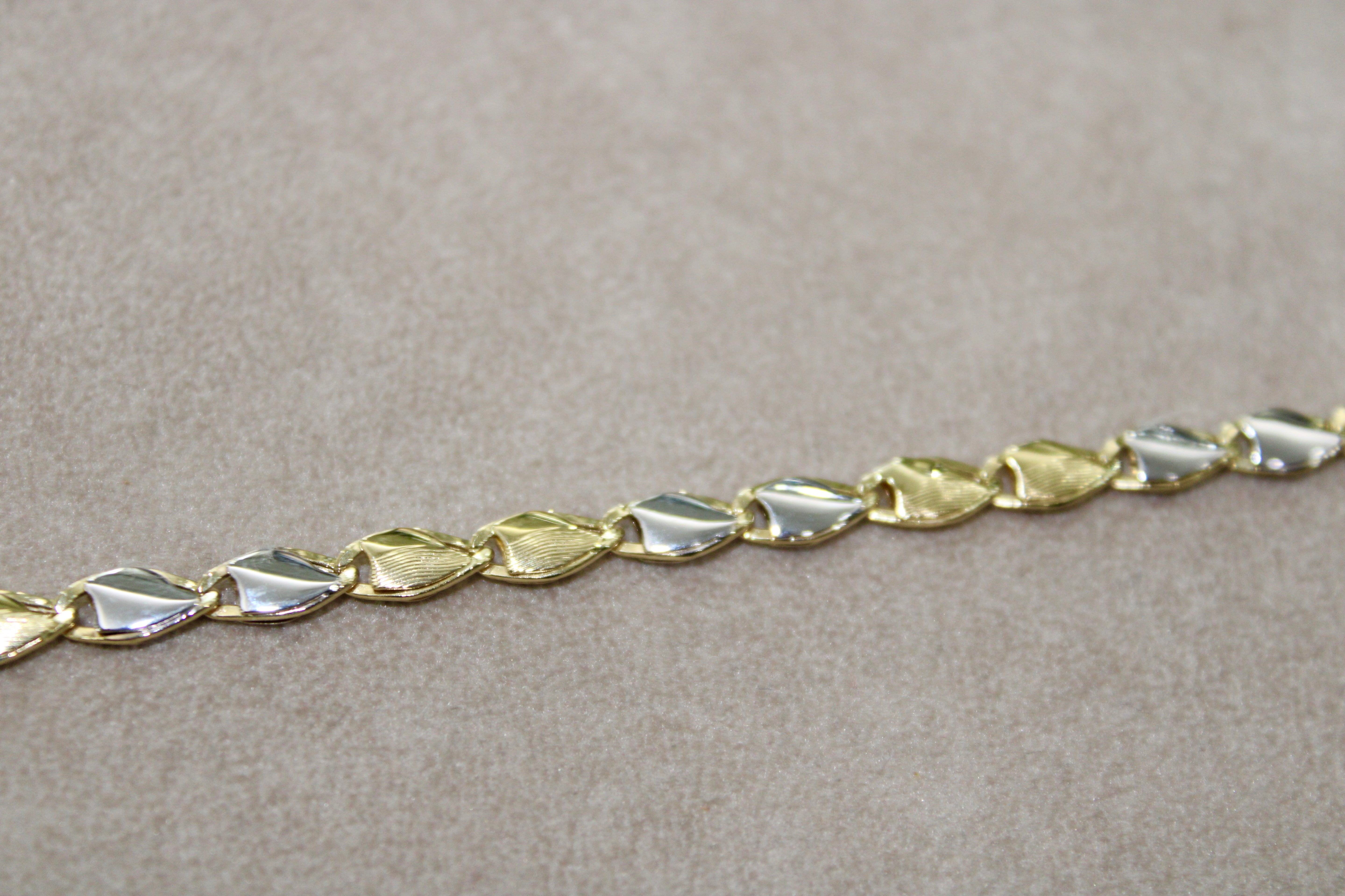 Bracciale bi-colore in oro 18k